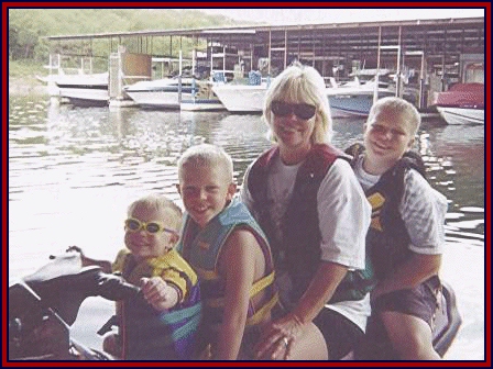 Sarah Gillespie and her three grandsons on their jet ski